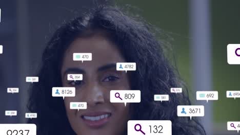 Animation-of-icon-and-changing-numbers-in-notification-bars,-portrait-of-smiling-biracial-woman