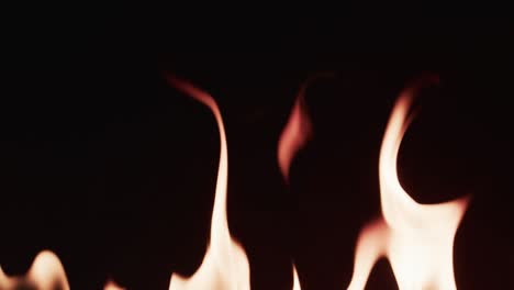 Video-of-yellow-fire-flames-and-copy-space-on-black-background
