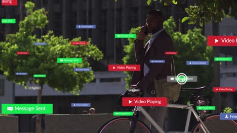 Animation-of-social-media-icons-over-african-american-man-talking-on-smartphone-on-the-street