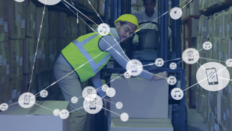 Animation-of-network-of-icons-over-caucasian-male-worker-stacking-boxes-on-a-forlift-at-warehouse