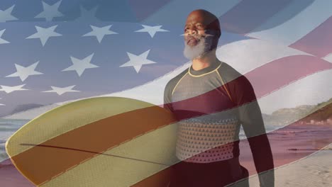 Animation-of-flag-of-usa-over-senior-african-american-man-with-surfboard-on-beach