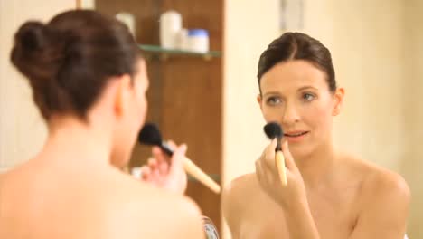 Beautiful-woman-applying-makeup