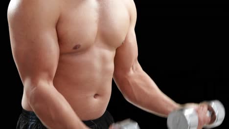 Bodybuilder-lifting-heavy-dumbbell