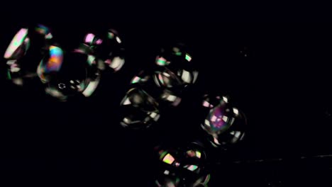 Bubbles-floating-on-black-background