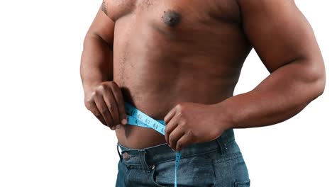 Muskulöser-Mann,-Der-Seine-Taille-Misst