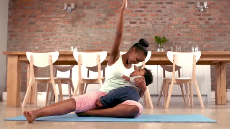 Mother-with-baby-doing-stretching-exercises