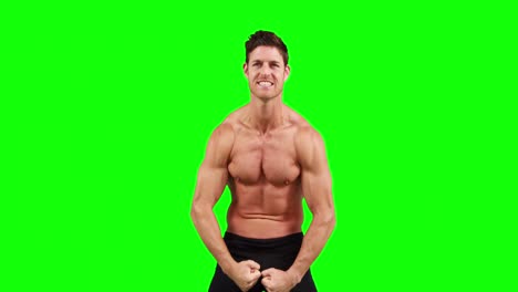 Hombre-Musculoso-Flexionando-Sus-Músculos