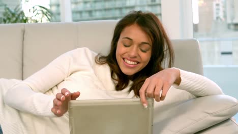 Woman-using-video-chat-on-tablet