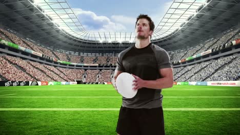 Ernsthafter-Rugbyspieler-Hält-Rugbyball