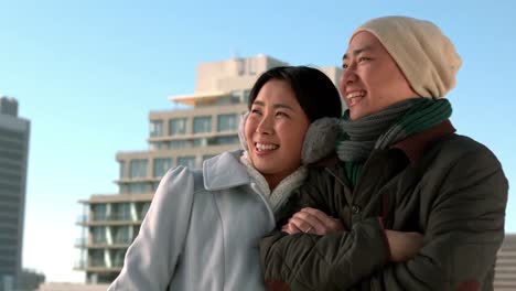 Loving-Asian-couple-in-winter-clothes-posing