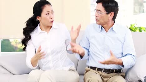 Mature-Asian-couple-arguing