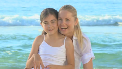 Mother-and-daughter-on-a-beach