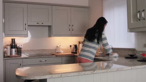 Asian-woman-cleaning-the-counters