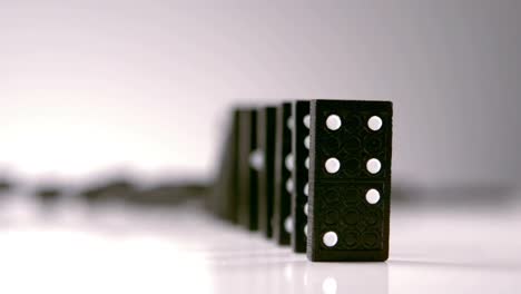Dominoes-pushing-others-dominoes-down