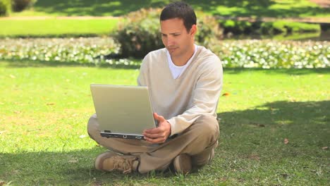 Young-man-working-on-his-laptop