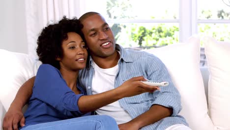 Happy-couple-with-remote-control