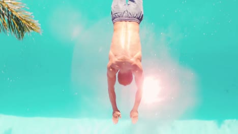 Athletic-man-diving-in-the-swimming-pool