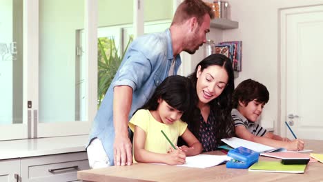 Parents-assisting-children-doing-homework