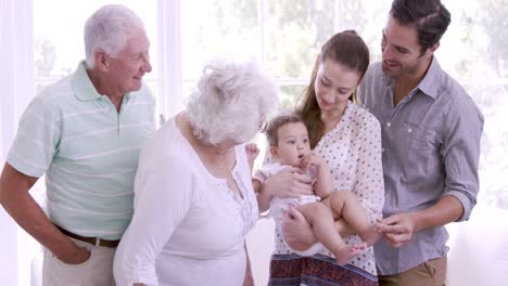 Happy-extended-family-with-baby