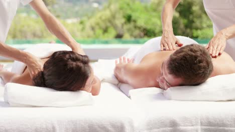Couple-receiving-a-back-massage