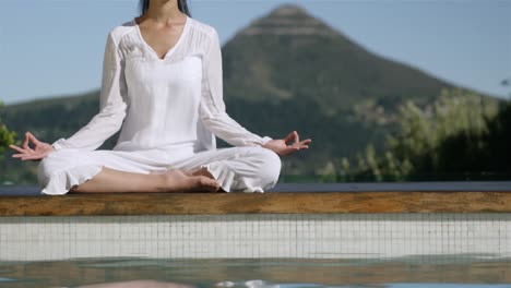 Calm-brunette-doing-yoga