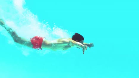 Schöner-Mann,-Der-Unter-Wasser-Schwimmt