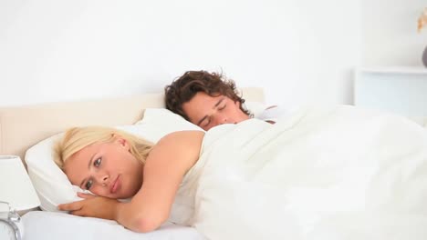 Waking-woman-while-husband-sleeping