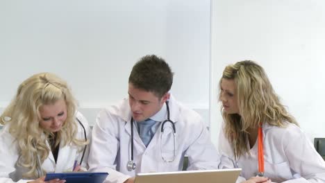 Three-young-doctors-working-together