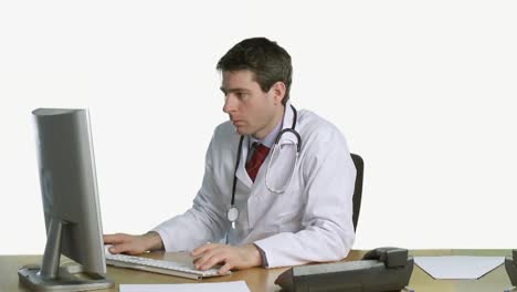 Arzt-Arbeitet-Am-Schreibtisch