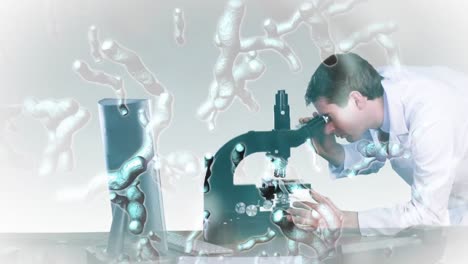 Researcher-looking-into-a-microscope-2