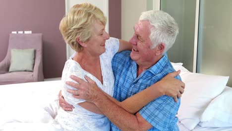 Senior-couple-hugging-each-other