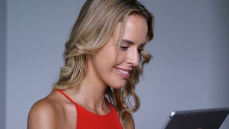 Blonde-women-using-digital-tablet