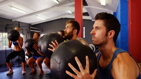 Group-of-people-exercising-with-exercise-ball