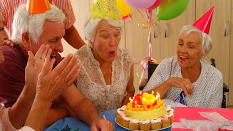 Senior-woman-celebrating-her-birthday-with-friends