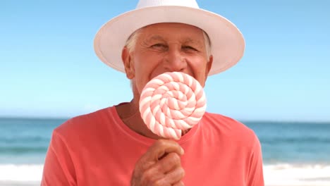 an-elderly-man-eating-a-lollipops-