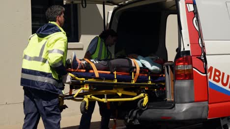 ambulance-team-carried-the-injured-woman-away-on-stretchers-