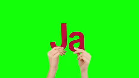 Woman-hand-holding-letters-J-and-A