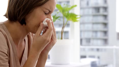 Woman-sneezing-several-times
