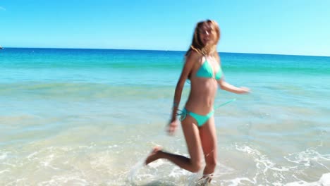 Woman-running-on-beach