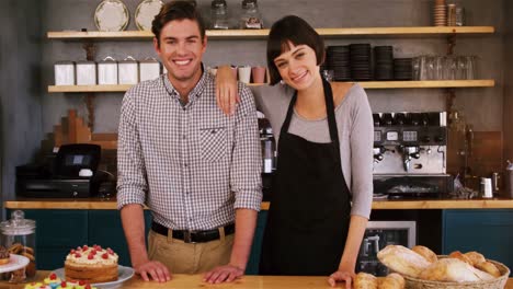 Portrait-of-waitress-standing-with-a-man