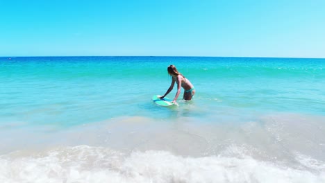 Woman-surfing-in-the-sea