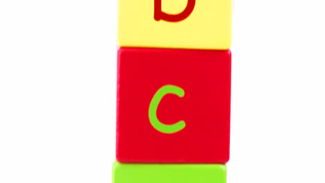 Panorama-of-colorful-alphabet-toy-blocks-in-a-tower