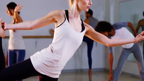 Woman-performing-stretching-exercise