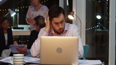 Businessman-working-on-laptop