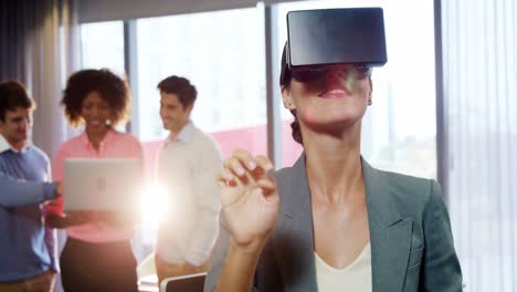 Businesswoman-using-the-virtual-reality-headset