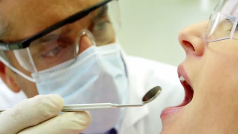 Dentist-examining-a-patient