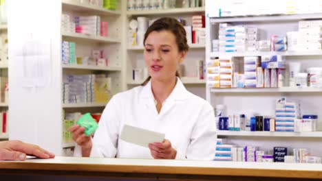 Customer-giving-prescriptions-of-medicine-to-pharmacist