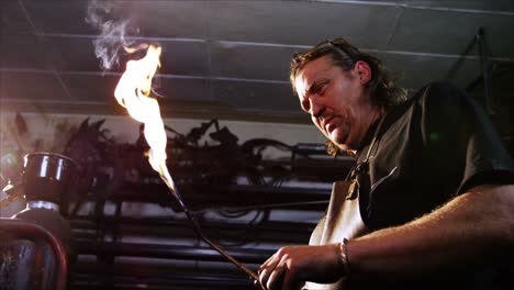 Welder-burning-welding-torch
