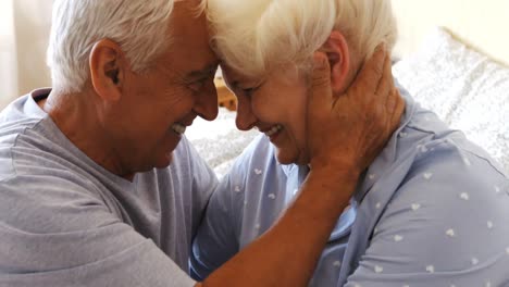 Senior-couple-embracing-each-other