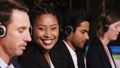Business-executives-using-headsets